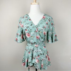 Loft green floral wrap top with peplum sleeves